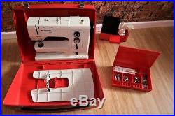 Bernina Record 830 sewing machine with accessories and carry case