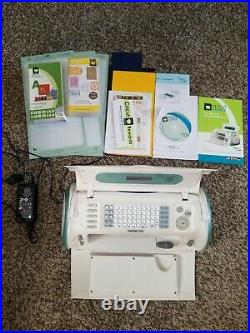 Cricut Personal Electronic Cutter CRV001 with Cartridges, Manuals, Carry case