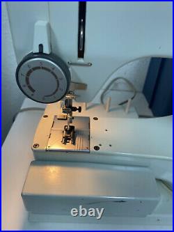 Elna SU 62C Free Arm Sewing Machine with carrying case & extras