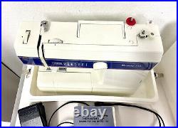 Husky 145 Husqvarna viking Sewing Machine w Foot Pedal and Carry Case