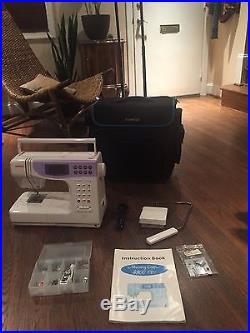 Janome Memory Craft 4900QC Mechanical Sewing Machine + carrying case + extras
