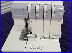 Janome Superlock 634D Serger Sewing Machine with Cloth Carrying Case