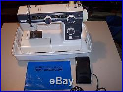 Janome model L392 Sewing Machine with carrying case. VGC