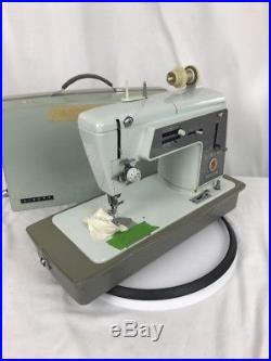 SINGER Touch & Sew Model 600 Sewing Machine withPedal & Carrying Case