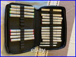 Set of 30 gently used Copic alcohol ink markers with carrying case