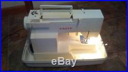 Singer Sewing Machine 5817 C with Carry Case. And foot pedal in great condition