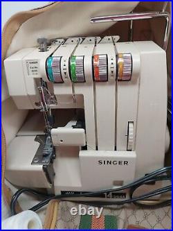 Singer Ultralock 14U64A Serger Sewing Machine with Foot Pedal Carrying Case Guide