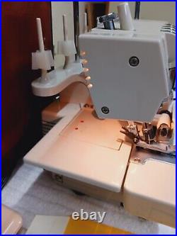 Singer Ultralock 14U64A Serger Sewing Machine with Foot Pedal Carrying Case Guides
