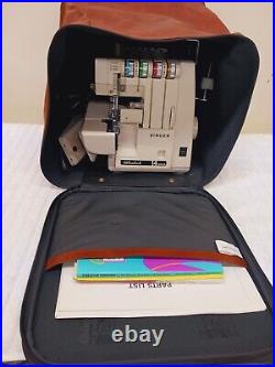 Singer Ultralock 14U64A Serger Sewing Machine with Foot Pedal Carrying Case Guides