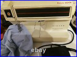 Singer futura 2001 Electric Sewing Machine in carry case with manual