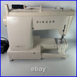 Singer sewing machine stylist 834 with carry case and foot pedal Vintage