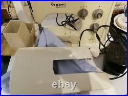 Swedish Viking Husqvarna 1010 Electric Sewing Machine in carry case with manual