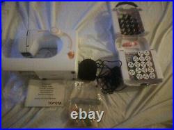 Toyota SE91 RS2000 Sewing Machine WithInstructions, foot pedal, carry case
