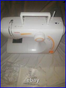 Toyota SE91 RS2000 Sewing Machine WithInstructions, foot pedal, carry case