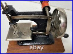 Vintage Cast Iron Baby Toy Hand Crank Sewing Machine & Bent Carry Case