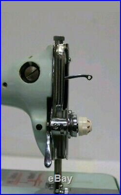 Vintage Jones sewing machine, light blue in carry case Excellent Condition