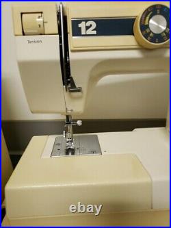 Vintage Kenmore Sewing Machine 385-1274180 with pedal, manual storage/carry case